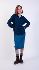 woman wearing VAAI belted cashmere wool cardigan top