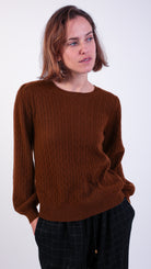 woman wearing VAAI brown cable Knit Balloon Sleeve Jumper