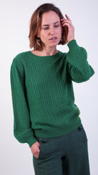 woman wearing VAAI green cable Knit Balloon Sleeve Jumper