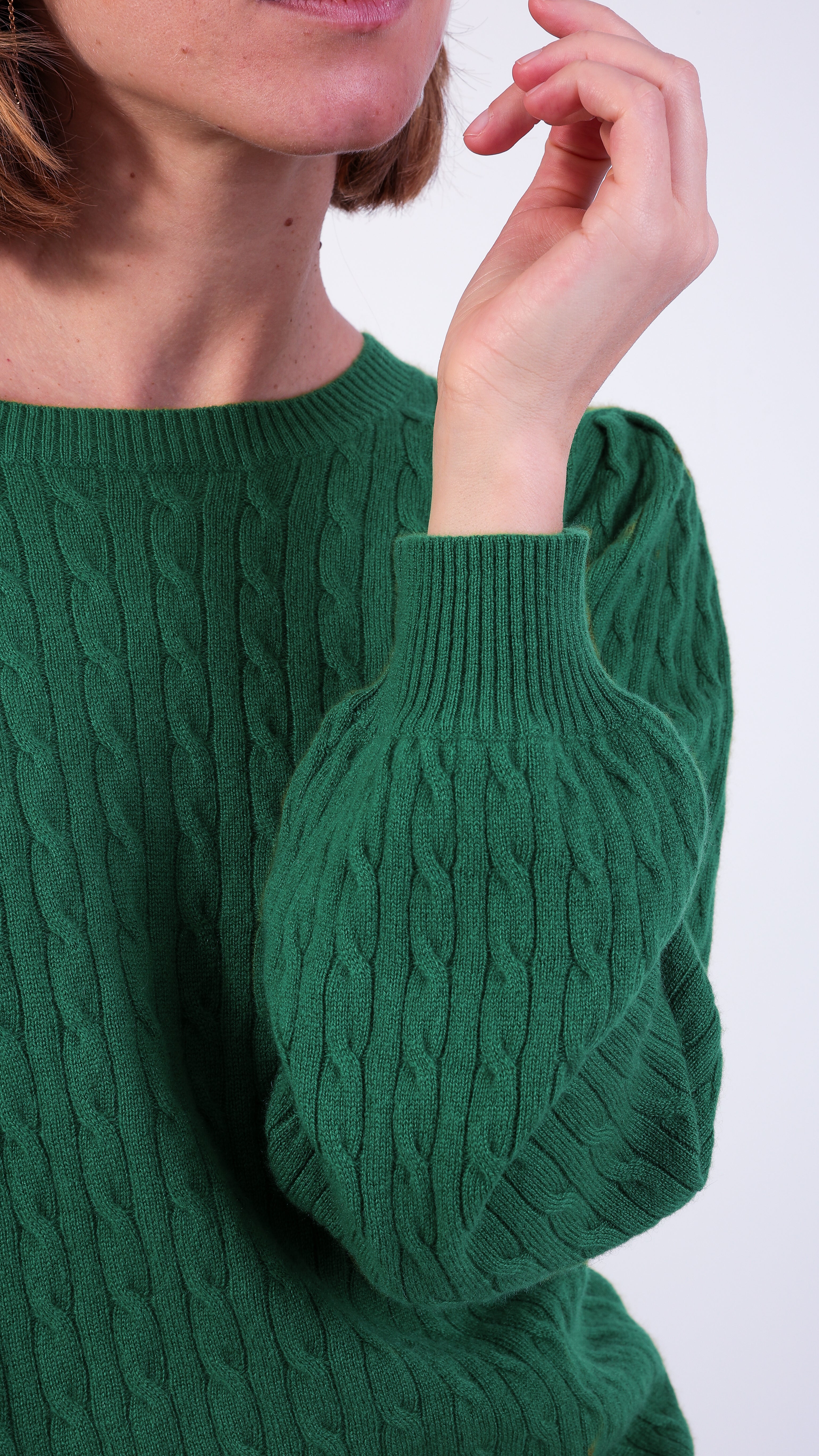 woman wearing VAAI green cable Knit Balloon Sleeve Jumper