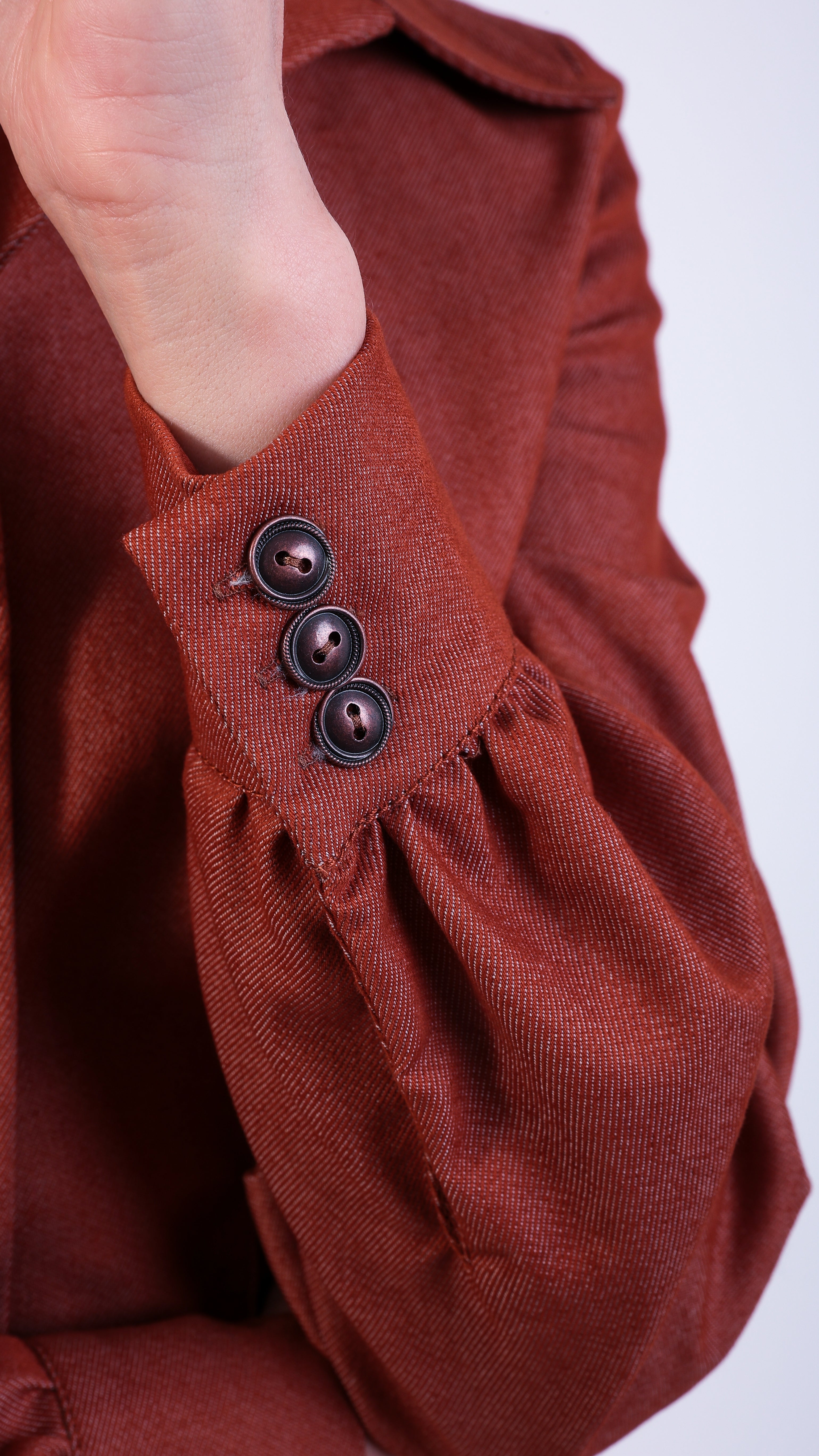 woman wearing VAAI terracotta denim fitted shirt