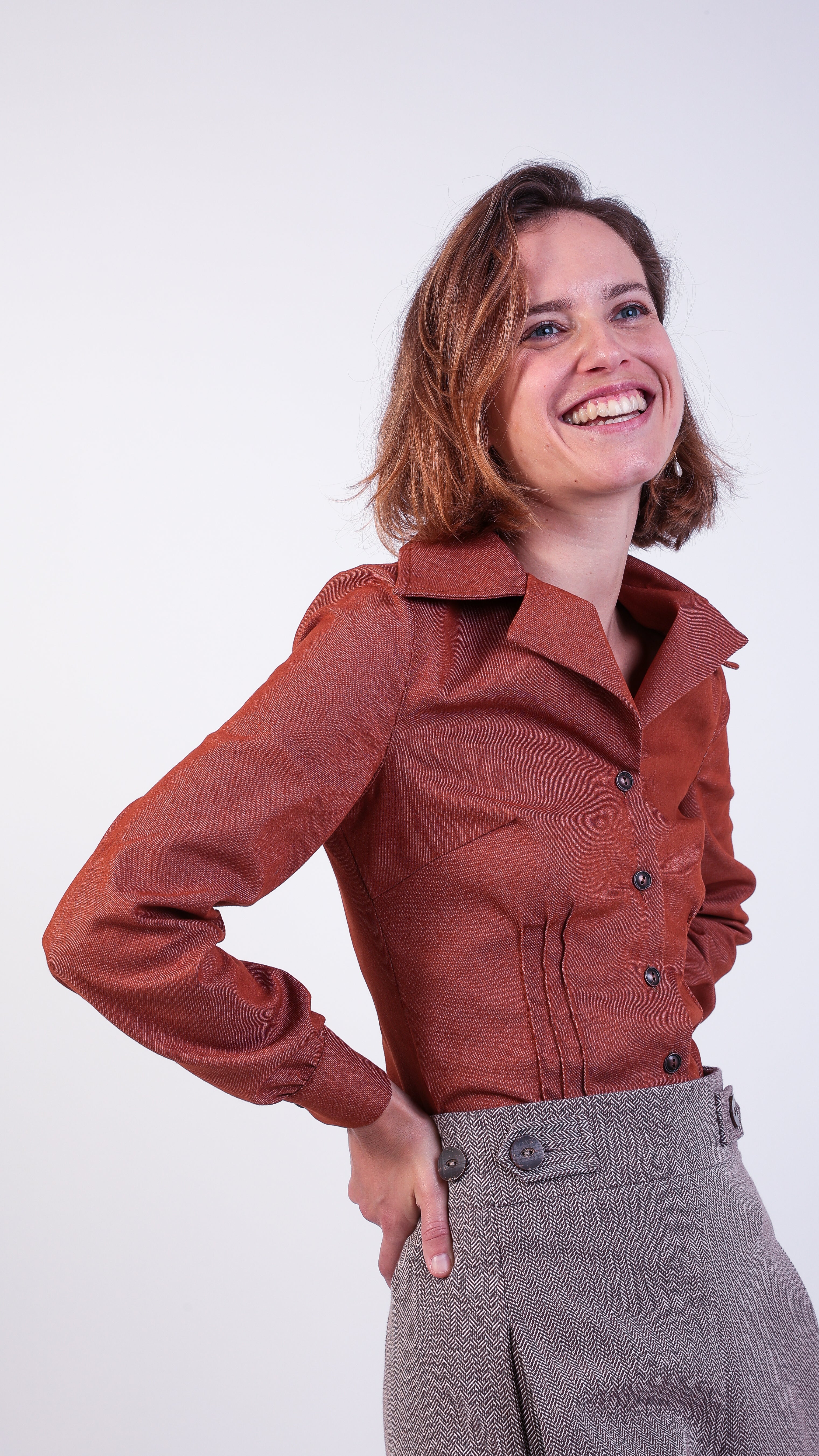 woman wearing VAAI terracotta denim fitted shirt