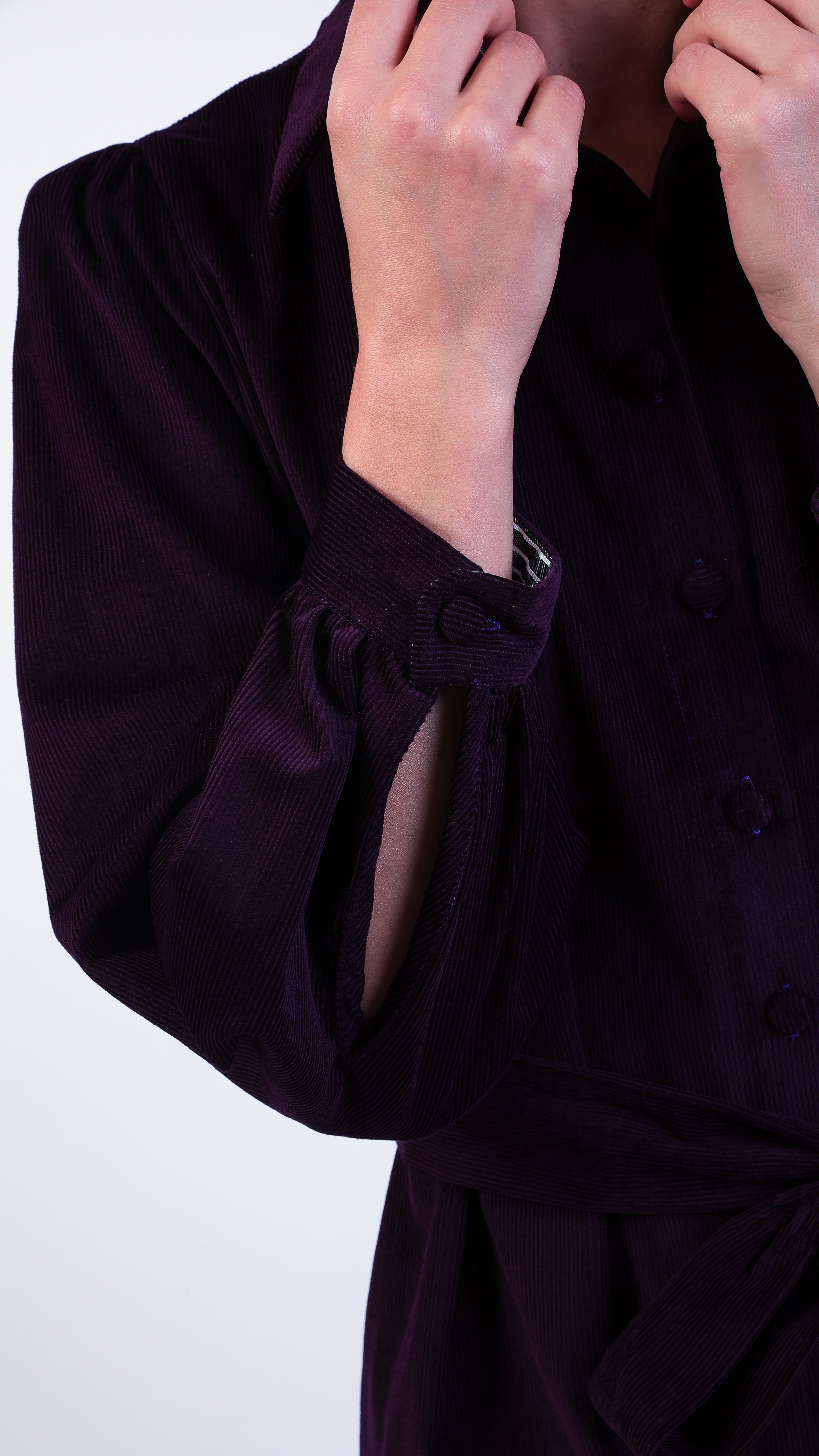 Woman wearing Aubergine corduroy shirt dress