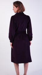 Woman wearing Aubergine corduroy shirt dress