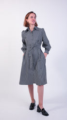 Woman wearing monochrome cotton shirt dress