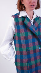 woman wearing VAAI double breasted british wool ruffle gilet