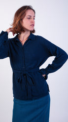 woman wearing VAAI belted cashmere wool cardigan top