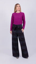 woman wearing VAAI belted checked british wool trousers