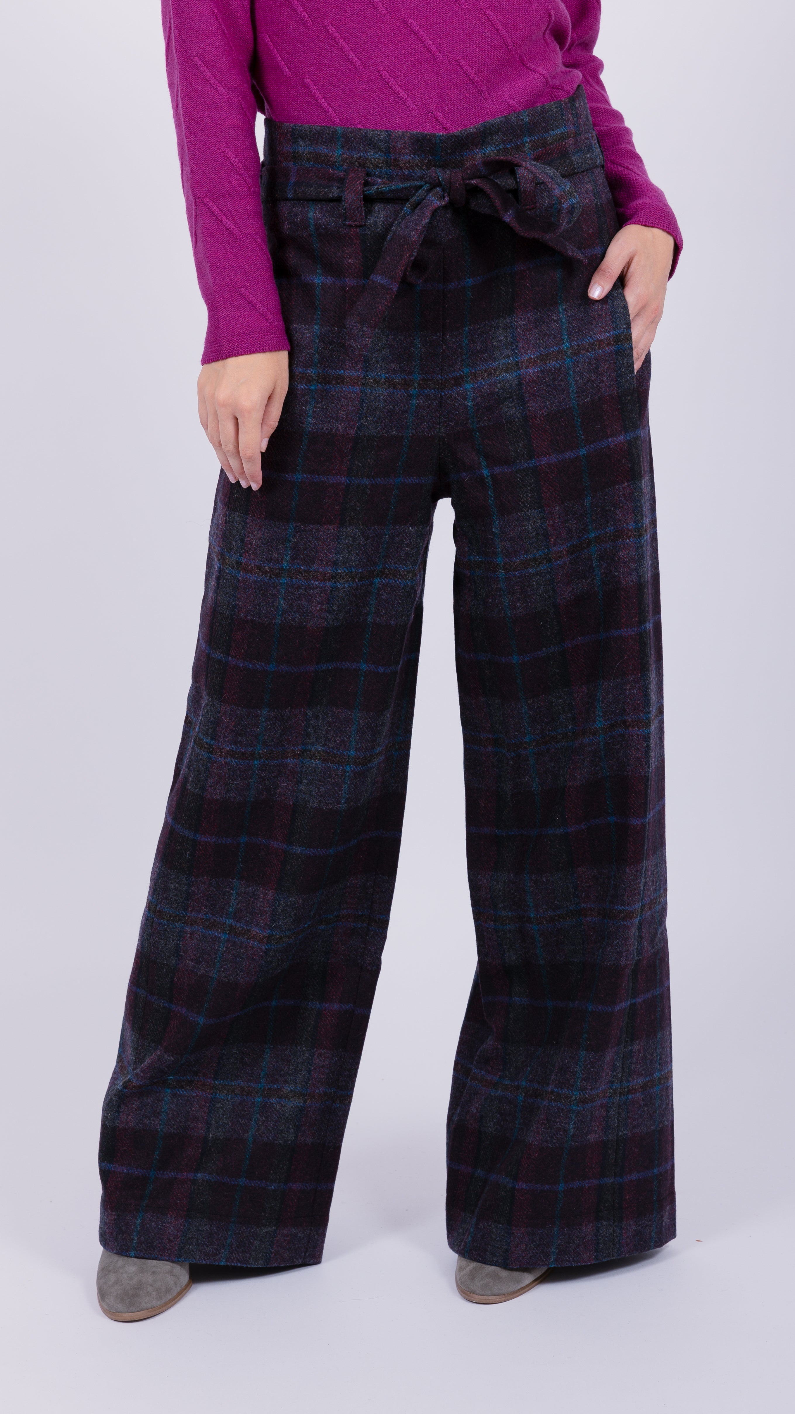 woman wearing VAAI belted checked british wool trousers