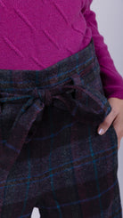 woman wearing VAAI belted checked british wool trousers