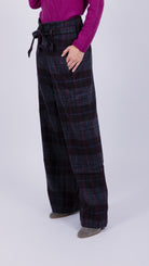 woman wearing VAAI belted checked british wool trousers