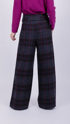 woman wearing VAAI belted checked british wool trousers