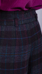 woman wearing VAAI belted checked british wool trousers