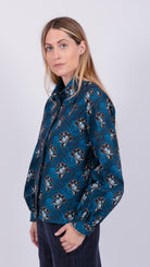 woman wearing floral print shirt