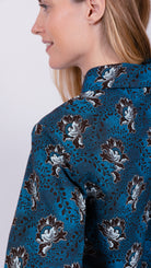 woman wearing floral print shirt