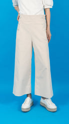 woman wearing VAAI ivory cropped needlecord high waisted trousers