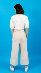 woman wearing VAAI ivory cropped needlecord high waisted trousers